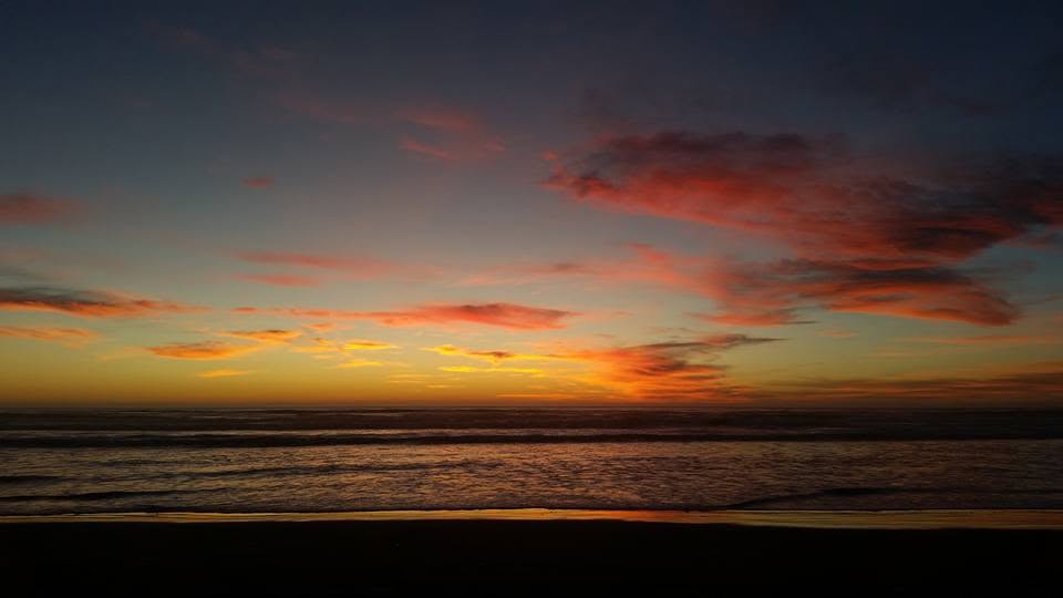 Sunset over the ocean from the beach at Oceano Dunes