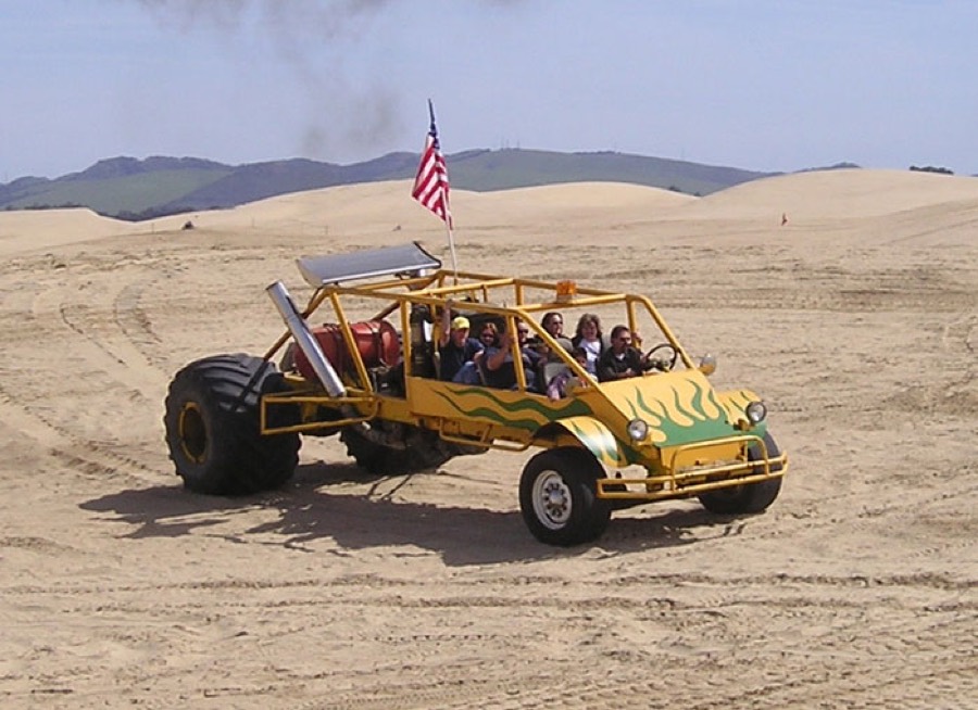 Sand rail with a family aboard